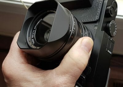Leica Q2 front view with its 28mm Summilux lens, shown beside the Leica Q3 for comparison