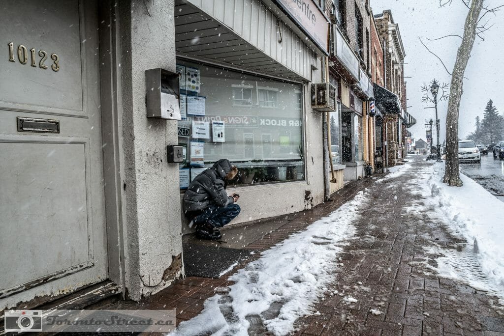 The phone Alone in snow storm Toronto, Canada Leica Q2 Street Photography
