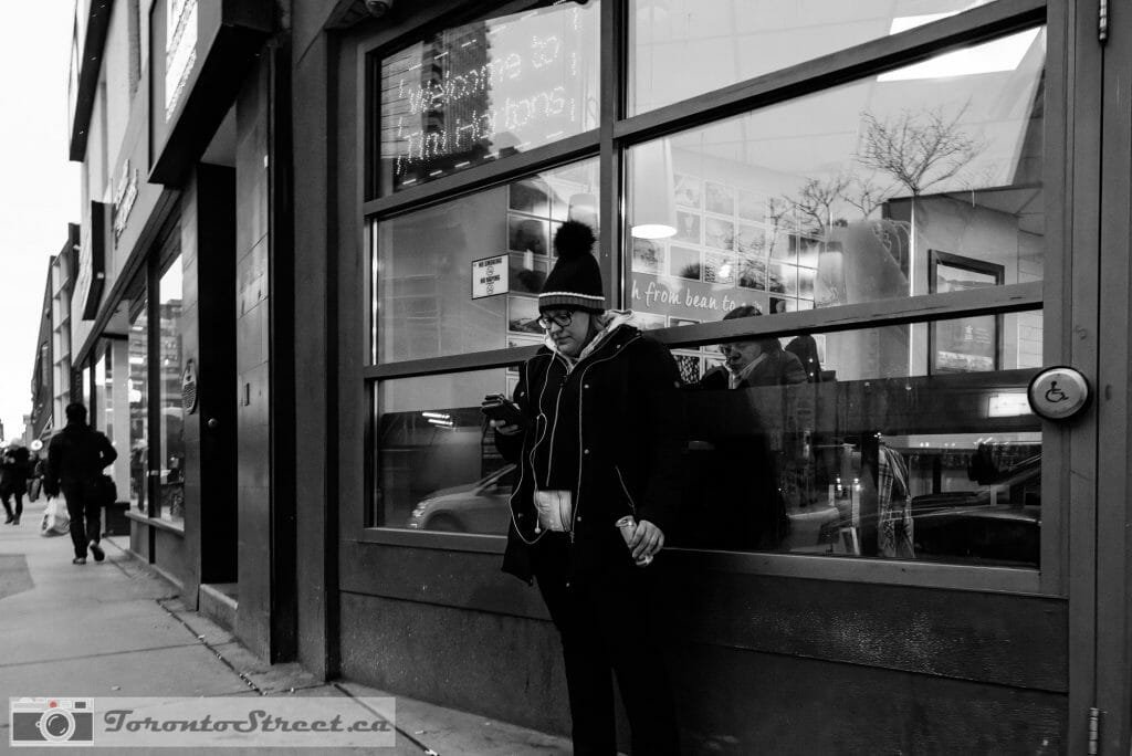 The phone B&W Toronto street image