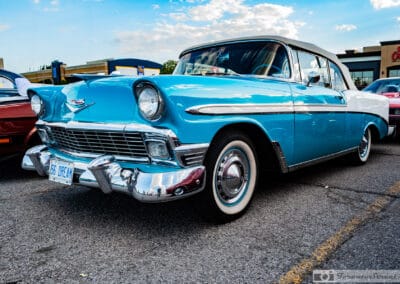 1956 Chevrolet Bel Air convertible in turquoise and white, 56 DREAM plate, whitewalls, at a Richmond Hill car meet, Leica Q3
