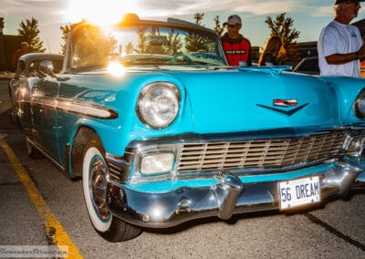 Turquoise drop-top from the rear among vendor tents at a Monday-night meet, Richmond Hill, Leica Q3