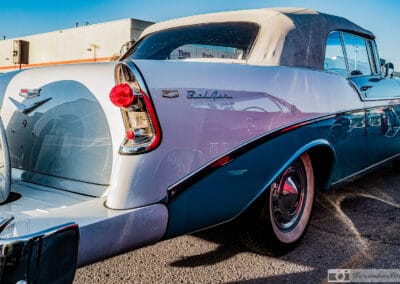 Rear of a 1956 Chevrolet Bel Air, continental spare kit, Bel Air script and teardrop light, Canadian Tire behind, Leica Q3