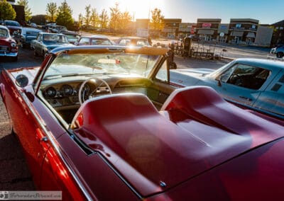 Red cockpit and dash of the convertible in the last of the evening light, Leica Q3