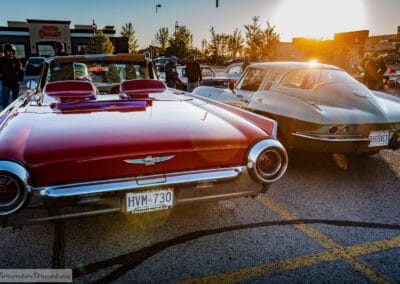 Rear deck of the red convertible, tonneau cover and round taillights at sunset, Leica Q3