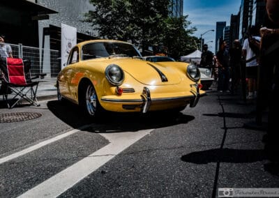 Yellow Porsche 356 on Bloor Street with the Yorkville crowd and downtown towers, Leica Q3