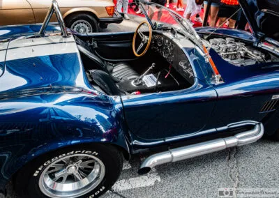 Chrome side pipe and a BFGoodrich wheel on a Shelby Cobra, Yorkville Exotic Car Show, Leica Q3