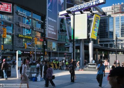 Yonge-Dundas Square on a Sunday afternoon, crowd and digital billboards, toronto sunday street photography, Fuji X100V