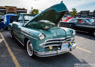 1950 Dodge Coronet convertible in jade green, hood up at a Richmond Hill cruise night, Leica Q3